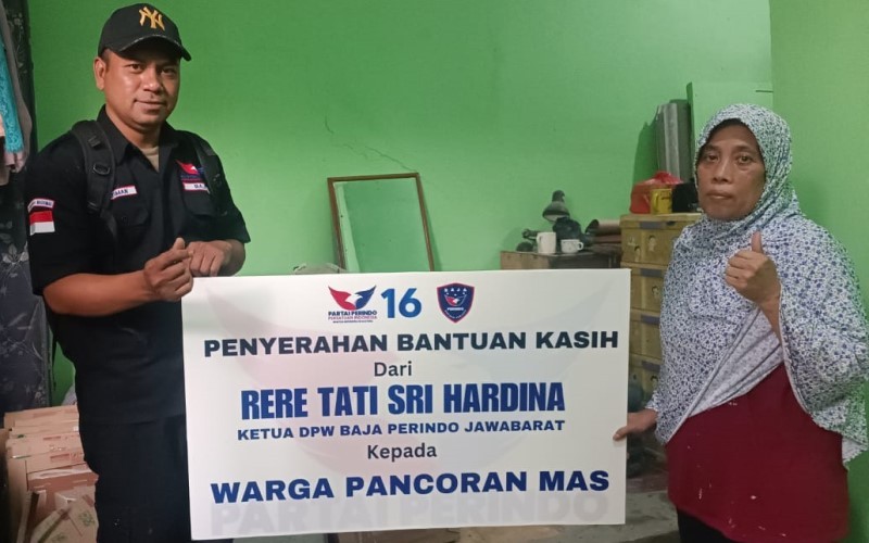 Bacaleg Partai Perindo Rere Tati Sri Hardina Serahkan Bantuan Bahan Bangunan untuk Warga Pancoran Mas Depok