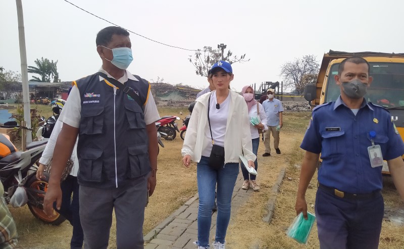 Partai Perindo Bagikan Masker untuk Petugas Pemadam Kebakaran di TPA Rawa Kucing Tangerang