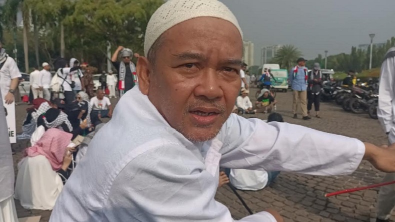 Kisah Wawan Ikut Aksi Bela Palestina di Monas, Gowes Sepeda Bonceng Anak dari Kebayoran
