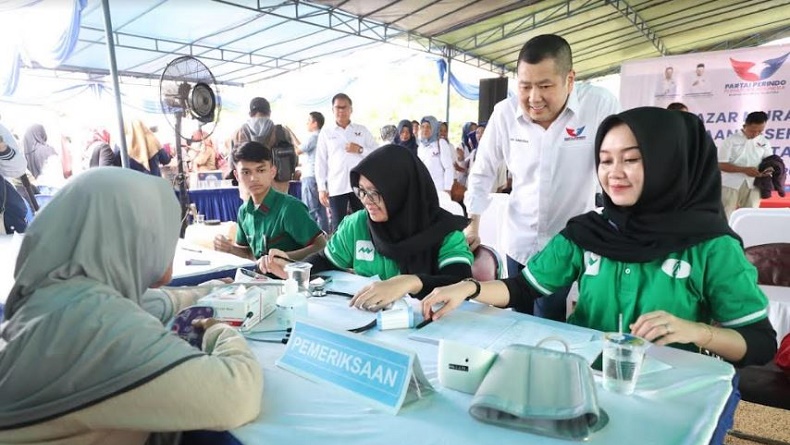 Warga Tangerang Terbantu Bazar Sembako Murah Partai Perindo, Beli Beras 2,5 Kg Hanya Rp5.000