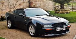 Elton John Lelang Mobil Aston Martin Vantage 1997