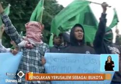 Tolak Kebijakan Trump, Massa Berunjuk Rasa di Depan Kedubes AS