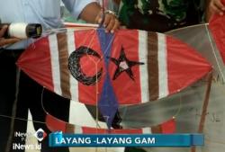 Terbangkan Layang-Layang Berlogo GAM, Dua Penjual Obat Diringkus Petugas