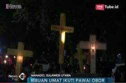 Sambut Jumat Agung, Ribuan Umat Nasrani Ikuti Pawai Obor di Manado