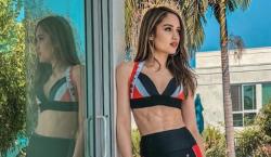 Pamer Perut Hasil Workout, Cinta Laura Bikin Salah Fokus