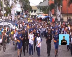 Setelah Aceh, Api Obor Asian Games Diarak di Danau Toba