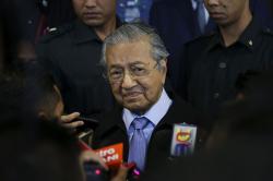 Akan Kunjungi China, Mahathir Diminta Temui Keluarga Korban MH370