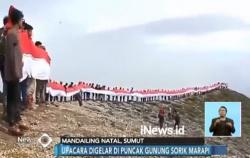 Ratusan Pemuda Kibarkan Bendera Sepanjang 100 Meter di Puncak Gunung Sorik Marapi