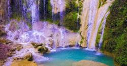 Eksotisme Air Terjun Kembang Soka yang Berwarna-warni di Kulonprogo