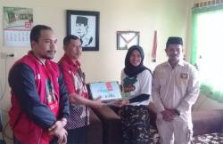 Tim Kirab Satu Negeri GP Asnor Sumbang Buku ke Sekolah di Maluku