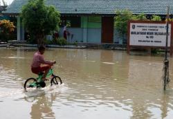 Jatim Dilanda Banjir Besar, TKD Jokowi-Ma’ruf Setop Sementara Kampanye<