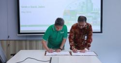 Bidik Potensi Bisnis dari Ojek Online, Bank Jatim Gandeng Grab