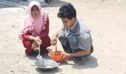 Video Warga Manfaatkan Cuaca Panas Ekstrem untuk Memasak
