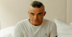 Robbie Williams Ungkap Tak Gunakan Ponsel selama 13 Tahun