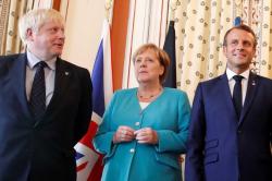 Soal Pengayaan Uranium, Angela Merkel, Macron, PM Johnson Kompak Desak Iran Tahan Diri
