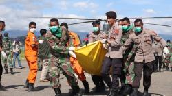 Foto-Foto Evakuasi 12 Jenazah Korban Heli MI-17 di Bandara Oksibil Pegunungan Bintang