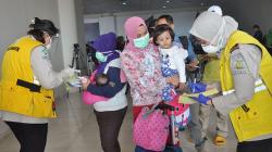 Tiba di Bandara Kualanamu, 134 TKI dari Malaysia Ikuti Proses Karantina