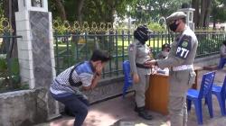 Razia Masker di Jalan Sisingamangaraja Medan, Puluhan Warga Terjaring dan Dihukum