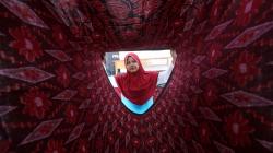 Melihat Pembuatan Sarung Tenun Ikat