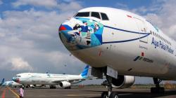 Penampakan Pesawat Garuda Indonesia Pakai Masker