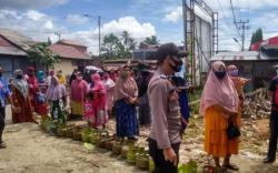 Pascabanjir Polisi Kawal Operasi Pasar Gas Elpiji 3 Kg <