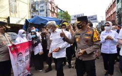 Satgas Covid-19 Sumsel Kembali Gencarkan Penerapan Prokes di Pasar Tradisional<
