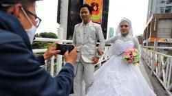 Pria Ini Jadi Fotografer Keliling dengan Smartphone di Lokasi Instagramable