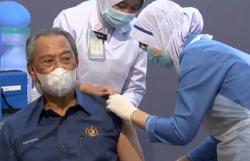 PM Muhyiddin Yassin Jadi Orang Pertama Disuntik Vaksin Covid di Malaysia