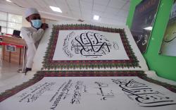  Masih Ditutup untuk Umum, Perawatan Alquran Raksasa di JIC Tetap Dilakukan