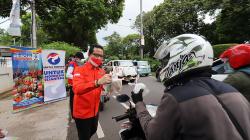 Foto Rescue Perindo Bagikan 400 Bungkus Takjil untuk Pengendara Bermotor