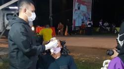 Pemeriksaan Ketat, Pelintas Jalani Tes Kesehatan di Pos Perbatasan Gorontalo-Sulut