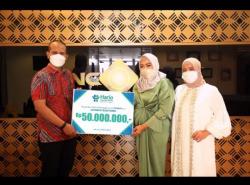 Hario Asuransi Online Serahkan Santunan ke Ahli Waris Nasabah Meninggal Akibat Covid-19