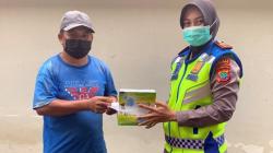 Aksi Simpatik ke Masyarakat, Satlantas Polres Minahasa Berikan Masker dan Vitamin