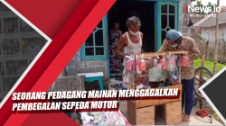 Video Seorang Pedagang Mainan Menggagalkan Pembegalan Sepeda Motor
