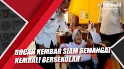Bocah Kembar Siam Semangat Kembali Bersekolah <