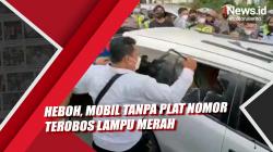 Heboh, Mobil Tanpa Plat Nomor Terobos Lampu Merah