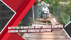 Video Aktifitas Menantang Maut Warga Kampung Ciodeng Lewati Jembatan Gantung