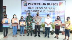 Kapolda Sulut Serahkan Bansos untuk Masyarakat Terdampak Covid-19 di Minahasa Tenggara