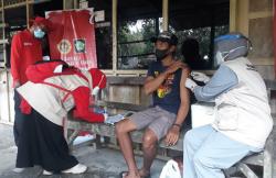 Susuri Persawahan dan Tegalan, BIN Lanjutkan Vaksinasi Door to Door di Kulonprogo