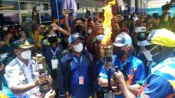 Terbang dari Biak Numfor, Obor Api PON XX Tiba di Timika Papua
