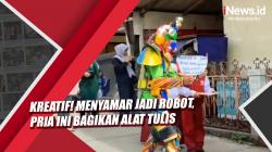 Menyamar Jadi Robot, Pria Ini Bagikan Alat Tulis ke Siswa SD saat PTM