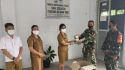 Kodim Minahasa Bagikan Vitamin Gratis kepada Warga Terpapar Covid-19