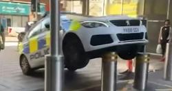 Viral Mobil Polisi Terangkat Portal Trotoar saat Razia