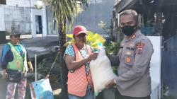 Terdampak Covid-19, Penyapu Jalan Dapat Bingkisan Bahan Makanan dari Kapolres Bitung 