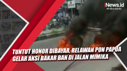 Video Tuntut Honor Dibayar, Relawan PON Papua Gelar Aksi Bakar Ban di Jalan Mimika<