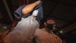 Malu, Dosen Unsri Tersangka Pelecehan Seksual Tutup Muka dengan Jaket<