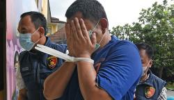 Buronan Kasus Korupsi Proyek Fiktif Tutup Muka saat Dibawa ke Polda Banten
