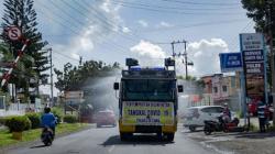 Cegah Lonjakan Covid-19, Polres Bitung Gandeng Pemkot Semprot Disinfektan secara Massal