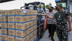 TNI-Polri Kawal Pendistribusian 1,1 Juta Kg Minyak Goreng yang Ditumpuk di Sumut