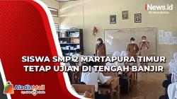 Miris! Siswa SMP 2 Martapura Timur Tetap Ujian di Tengah Banjir